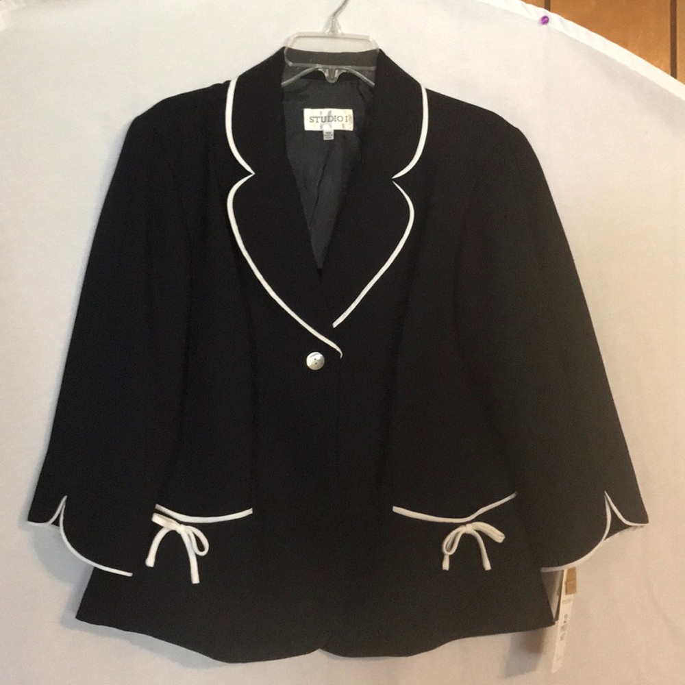 Navy Blazer with White Detail.